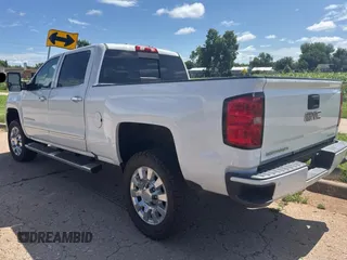 2016 GMC Sierra 2500HD Denali z VIN 1GT12UE84GF183401, wystawiony jako Copart lot #60241455 z przebiegiem 163 535 mil mil oraz Szkoda całkowita • Salvage title. Historia ofert i sprzedaży dostępna na DreamBid. Obrazek 3.