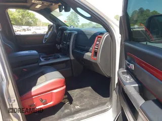 2016 Ram 1500 Rebel z VIN 1C6RR7YT7GS185173, wystawiony jako IAAI lot #42033684 z przebiegiem 152 758 mil mil oraz . Historia ofert i sprzedaży dostępna na DreamBid. Obrazek 5.