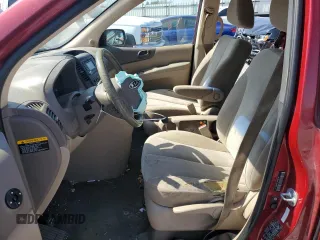 2011 Kia Sedona LX with VIN KNDMG4C77B6388700, listed as a Copart auction lot 71572634 with 169,016 mi miles and Salvage Title. Bid and sale history available at carsss.com. Image 7.