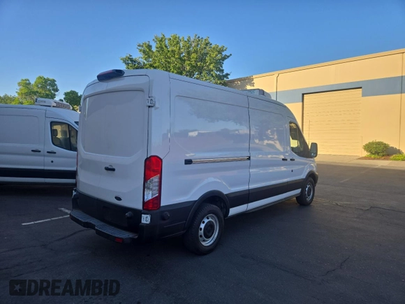 2019 Ford Transit with VIN 1FTYR2CM0KKA98621, listed as a Copart auction lot 60940125 with 77,075 mi miles and Salvage title. Bid and sale history available at DreamBid. Image 4.