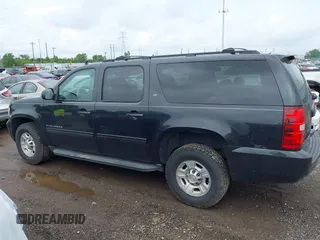 2011 Chevrolet Suburban with VIN 1GNWKMEG1BR374950, listed as a IAAI auction lot 42781182 with 304,690 mi miles and . Bid and sale history available at DreamBid. Image 14.