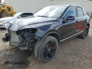 2015 Volkswagen Touareg Sport z VIN WVGEF9BP3FD004771, wystawiony jako Copart lot #58668125 z przebiegiem 64 422 mil mil oraz Czysty tytuł • Clean title. Historia ofert i sprzedaży dostępna na DreamBid. Obrazek 1.