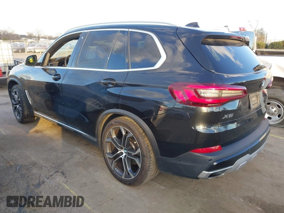 2021 BMW X5 xDrive40i with VIN 5UXCR6C08M9D76272, listed as a IAAI auction lot 41219782 with 56,599 mi miles and . Bid and sale history available at DreamBid. Image 3.