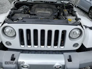 2018 Jeep Wrangler Unlimited Sahara with VIN 1C4HJWEG4JL922375, listed as a Copart auction lot 55333765 with 111,986 mi miles and Salvage title. Bid and sale history available at DreamBid. Image 12.