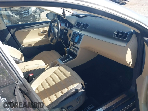 2013 Volkswagen CC Sport with VIN WVWBN7AN0DE551132, listed as a IAAI auction lot 41849514 with 144,557 mi miles. Bid and sale history available at carsss.com. Image 5.