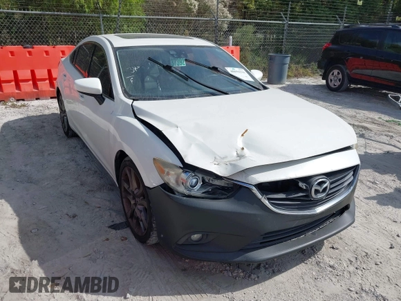 2015 Mazda 6 i Grand Touring with VIN JM1GJ1W50F1204322, listed as a IAAI auction lot 40694216 with 141,357 mi miles. Bid and sale history available at carsss.com. Image 6.