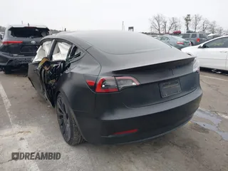 2023 Tesla Model 3 Performance with VIN 5YJ3E1ECXPF595295, listed as a IAAI auction lot 41501111 with 1 mi miles. Bid and sale history available at carsss.com. Image 3.