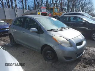2010 Toyota Yaris with VIN JTDKT4K33A5293606, listed as a IAAI auction lot 41574444 with 262,584 mi miles. Bid and sale history available at carsss.com. Image 1.