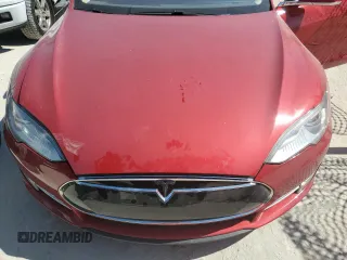 2014 Tesla Model S 60 z VIN 5YJSA1H19EFP27946, wystawiony jako Copart lot #61284625 z przebiegiem 109 147 mil mil oraz Szkoda całkowita • Salvage title. Historia ofert i sprzedaży dostępna na DreamBid. Obrazek 11.