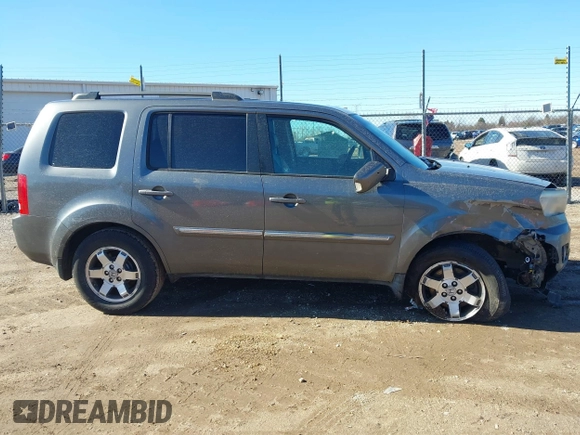 2010 Honda Pilot Touring with VIN 5FNYF4H93AB008589, listed as a IAAI auction lot 41731084 with 138,554 mi miles and . Bid and sale history available at carsss.com. Image 13.