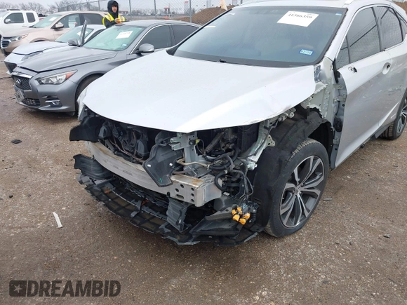 2016 Lexus RX 450h with VIN 2T2BGMCA6GC002928, listed as a IAAI auction lot 41566359 with 98,437 mi miles and . Bid and sale history available at DreamBid. Image 6.