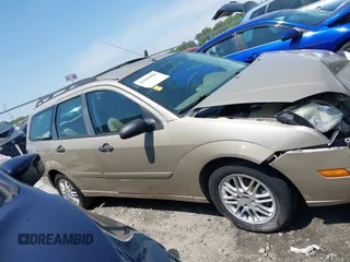 2007 Ford Focus SE z VIN 1FAFP36N77W130848, wystawiony jako IAAI lot #41986099 z przebiegiem 65 649 mil mil oraz . Historia ofert i sprzedaży dostępna na DreamBid. Obrazek 13.