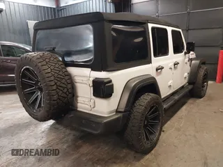 2019 Jeep Wrangler Unlimited Sport S z VIN 1C4HJXDG4KW639403, wystawiony jako IAAI lot #42158096 z przebiegiem 132 569 mil mil oraz . Historia ofert i sprzedaży dostępna na DreamBid. Obrazek 4.