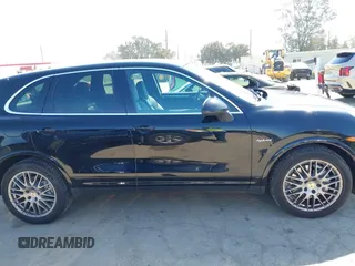 2012 Porsche Cayenne S Hybrid with VIN WP1AE2A23CLA93096, listed as a IAAI auction lot 41972843 with 79,139 mi miles. Bid and sale history available at carsss.com. Image 13.