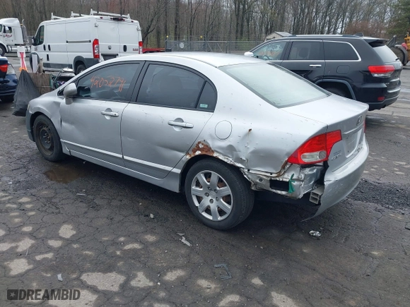 2009 Honda Civic Sdn LX with VIN 2HGFA16559H313538, listed as a IAAI auction lot 42052791 with 136,594 mi miles. Bid and sale history available at carsss.com. Image 3.