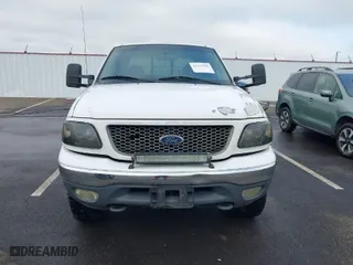 2001 Ford F-150 SuperCrew XLT with VIN 1FTRW08W11KD99683, listed as a IAAI auction lot 41329500 with 218,080 mi miles. Bid and sale history available at carsss.com. Image 12.