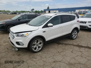 2018 Ford Escape Titanium with VIN 1FMCU0J93JUC31821, listed as a Copart auction lot 57483905 with 86,018 mi miles and Clean title. Bid and sale history available at DreamBid. Image 1.