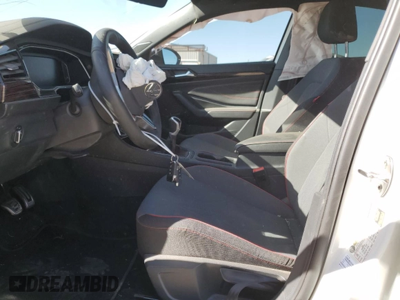 2024 Volkswagen Jetta 40th Anniversary Edition with VIN 3VW8T7BU0RM068373, listed as a Copart auction lot 77764614 with 12,128 mi miles and Salvage title. Bid and sale history available at DreamBid. Image 7.