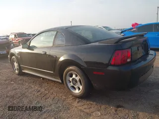 1999 Ford Mustang with VIN 1FAFP4047XF221818, listed as a IAAI auction lot 42261984 with 156,577 mi miles and . Bid and sale history available at DreamBid. Image 3.