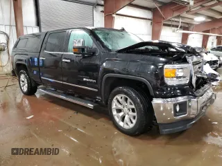 2015 GMC Sierra 1500 SLT with VIN 3GTU2VEJXFG517420, listed as a Copart auction lot 42144385 with 122,446 mi miles and Clean Title. Bid and sale history available at DreamBid. Image 4.