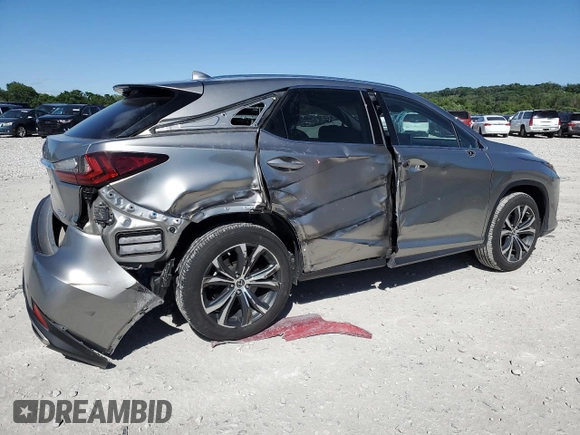 2021 Lexus RX 350 with VIN 2T2HZMDA0MC260229, listed as a Copart auction lot 57242465 with 51,051 mi miles and Salvage title. Bid and sale history available at DreamBid. Image 3.