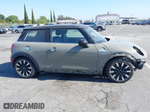 2019 MINI Hardtop Cooper S z VIN WMWXP7C51K2A50911, wystawiony jako IAAI lot #42194823 z przebiegiem 32 820 mil mil oraz . Historia ofert i sprzedaży dostępna na DreamBid. Obrazek 14.