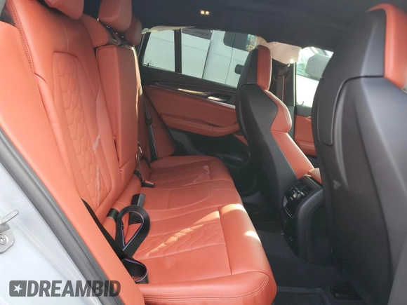 2024 BMW X4 M z VIN 5YM23EC01R9W18369, wystawiony jako Copart lot #53838455 z przebiegiem 11 550 mil mil oraz Szkody całkowita. Historia ofert i sprzedaży dostępna na DreamBid. Obrazek 11.
