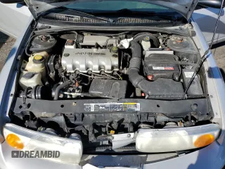 2001 Saturn SL z VIN 1G8ZH52891Z317279, wystawiony jako Copart lot #55163885 z przebiegiem 136 029 mil mil oraz Nie do naprawy • Non repairable. Historia ofert i sprzedaży dostępna na DreamBid. Obrazek 11.
