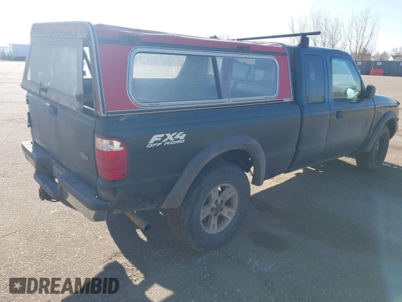 2002 Ford Ranger XL Fleet with VIN 1FTZR45EX2PA41562, listed as a IAAI auction lot 41518437 with 302,842 mi miles. Bid and sale history available at carsss.com. Image 4.