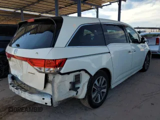 2014 Honda Odyssey Touring с VIN 5FNRL5H94EB110797, выставлен на аукционе Copart как лот 60702365 с пробегом 106 131 миль миль и Списание • Salvage title. История ставок и продаж доступна на DreamBid. Изображение 3.