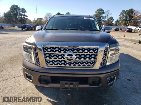 2017 Nissan Titan SL z VIN 1N6AA1E54HN512447, wystawiony jako Copart lot #85330734 z przebiegiem 119 424 mil mil oraz Czysty tytuł • Clean title. Historia ofert i sprzedaży dostępna na DreamBid. Obrazek 5.