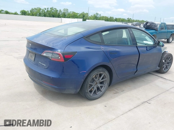 2022 Tesla Model 3 Long Range z VIN 5YJ3E1EB2NF246443, wystawiony jako IAAI lot #42179219 z przebiegiem Nie podano mil oraz . Historia ofert i sprzedaży dostępna na DreamBid. Obrazek 4.