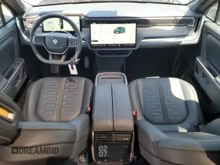 2024 Rivian R1S Adventure z VIN 7PDSGBBA0RN034793, wystawiony jako Copart lot #55091885 z przebiegiem 20 154 mil mil oraz Szkody całkowita. Historia ofert i sprzedaży dostępna na DreamBid. Obrazek 8.