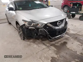 2016 Nissan Maxima SL with VIN 1N4AA6AP6GC384851, listed as a IAAI auction lot 41663659 with 127,247 mi miles and . Bid and sale history available at DreamBid. Image 6.