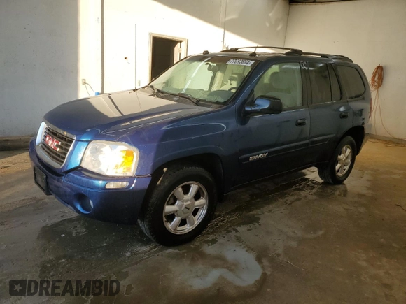2005 GMC Envoy SLT with VIN 1GKDS13S652339845, listed as a Copart auction lot 77693684 with 220,306 mi miles and Salvage Title. Bid and sale history available at carsss.com. Image 1.