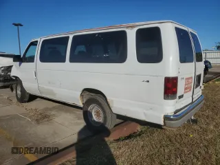 2002 Ford Econoline Passenger XL with VIN 1FBSS31S82HB36096, listed as a Copart auction lot 80654574 with 170,656 mi miles and Salvage title. Bid and sale history available at DreamBid. Image 2.