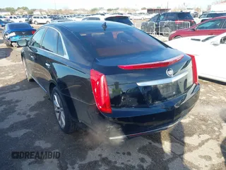 2013 Cadillac XTS Luxury with VIN 2G61P5S34D9237884, listed as a IAAI auction lot 41336761 with 156,830 mi miles and . Bid and sale history available at DreamBid. Image 3.
