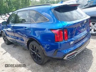 2021 Kia Sorento SX z VIN 5XYRK4LF5MG028384, wystawiony jako IAAI lot #42132667 z przebiegiem 64 649 mil mil oraz . Historia ofert i sprzedaży dostępna na DreamBid. Obrazek 3.