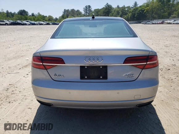 2016 Audi A8 Sport z VIN WAU43AFD7GN005425, wystawiony jako Copart lot #58781405 z przebiegiem 139 435 mil mil oraz Szkoda całkowita • Salvage title. Historia ofert i sprzedaży dostępna na DreamBid. Obrazek 6.