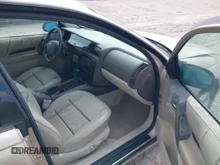 1998 Cadillac Catera z VIN W06VR52R3WR179841, wystawiony jako IAAI lot #41535621 z przebiegiem 103 204 mil mil oraz . Historia ofert i sprzedaży dostępna na DreamBid. Obrazek 5.