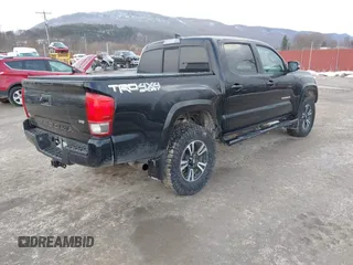 2016 Toyota Tacoma SR with VIN 3TMCZ5AN2GM027945, listed as a IAAI auction lot 41446277 with 51,781 mi miles and . Bid and sale history available at DreamBid. Image 4.