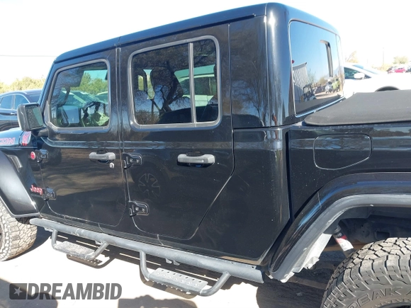 2020 Jeep Gladiator Rubicon z VIN 1C6JJTBG0LL117908, wystawiony jako IAAI lot #41621920 z przebiegiem 61 233 mil mil oraz . Historia ofert i sprzedaży dostępna na DreamBid. Obrazek 14.