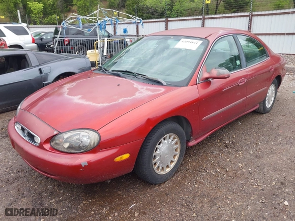 1999 Mercury Sable GS with VIN 1MEFM50UXXA649466, listed as a IAAI auction lot 42094811 with 122,644 mi miles. Bid and sale history available at carsss.com. Image 2.