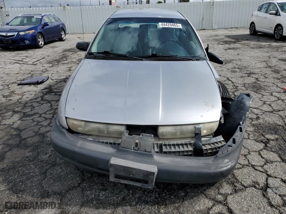 1996 Saturn SL with VIN 1G8ZH5288TZ156412, listed as a Copart auction lot 44429465 with 141,560 mi miles and Salvage Title. Bid and sale history available at carsss.com. Image 5.