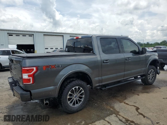 2018 Ford F-150 XL with VIN 1FTEW1EG7JFC40015, listed as a Copart auction lot 60659755 with 194,645 mi miles and Salvage title. Bid and sale history available at DreamBid. Image 3.
