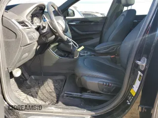 2016 BMW X1 xDrive28i z VIN WBXHT3C35G5E50005, wystawiony jako Copart lot #74476533 z przebiegiem 128 031 mil mil oraz Szkoda całkowita • Salvage title. Historia ofert i sprzedaży dostępna na DreamBid. Obrazek 7.