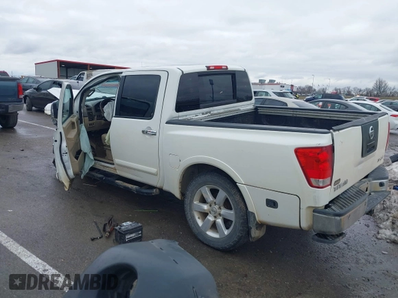 2012 Nissan Titan SL with VIN 1N6AA0EC7CN311109, listed as a IAAI auction lot 41420110 with 209,731 mi miles and . Bid and sale history available at DreamBid. Image 3.