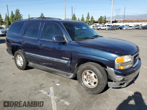 2004 GMC Yukon SLE with VIN 1GKEC13V84R179274, listed as a Copart auction lot 77367204 with 309,239 mi miles and Salvage Title. Bid and sale history available at carsss.com. Image 4.