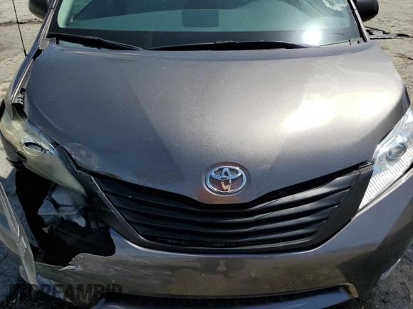 2014 Toyota Sienna L z VIN 5TDZK3DC0ES409479, wystawiony jako Copart lot #51643485 z przebiegiem 119 709 mil mil oraz Szkoda całkowita • Salvage title. Historia ofert i sprzedaży dostępna na DreamBid. Obrazek 12.