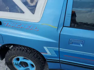 1994 Geo Tracker z VIN 2CNBE18U0R6940807, wystawiony jako Copart lot #78071244 z przebiegiem 116 472 mil mil oraz Nie do naprawy. Historia ofert i sprzedaży dostępna na DreamBid. Obrazek 12.